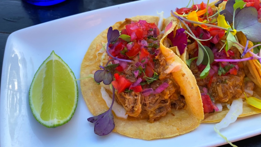 Slow cooked mexican cochinita pibil tacos with lime, juicy authentic pork tacos, 4K shot Royalty-Free Stock Footage #1086432362