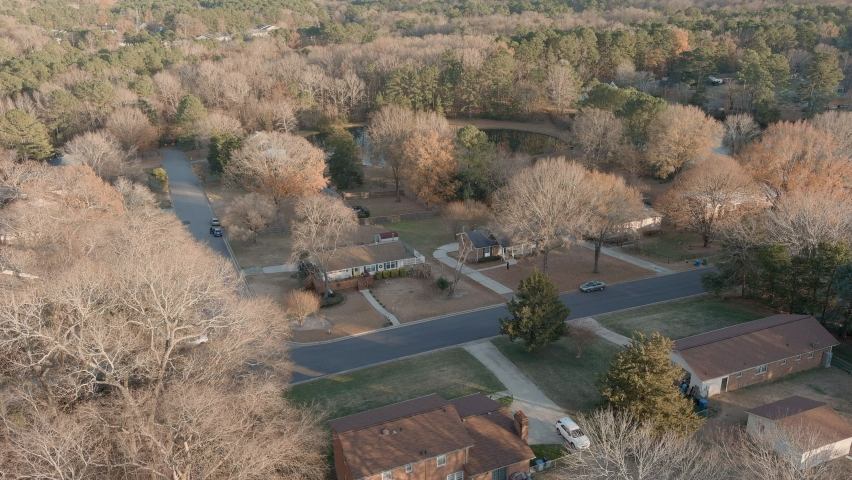 Aerial Over Durham City Suburban Neighborhood, Pond And Trees In Fall