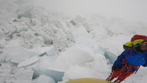 Mountaineer climbing world's fourth-highest peak Mount Lhotse.