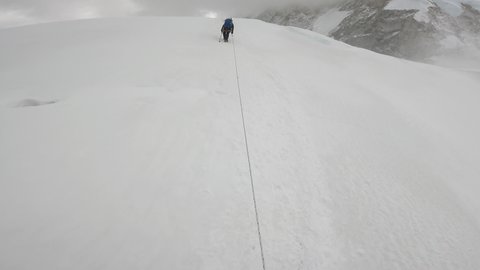 Mountaineer climbing world's fourth-highest peak Mount Lhotse.