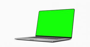 Laptop frameless screen - camera rotation around the display. The video includes a green screen, a luma matte mask, and a screen tracking layer. 30fps 4k UHD video