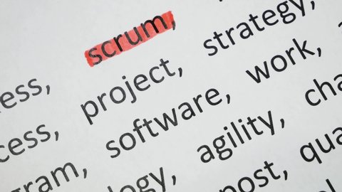 Word scrum software undelnines among other words printed on white paper. projects methodology and development team workflow concept.