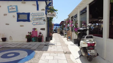 Street of the city of Bodrum with authentic white houses. Bodrum Turkey August 2021