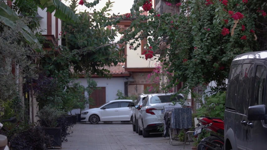 Narrow alley street with Ottoman style historical building in old town of Antalya.