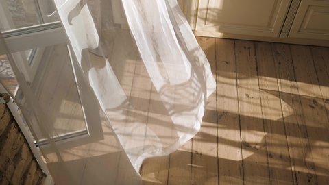 Sun Rays Shine Into Home At Room Through Tulle Curtain In Morning