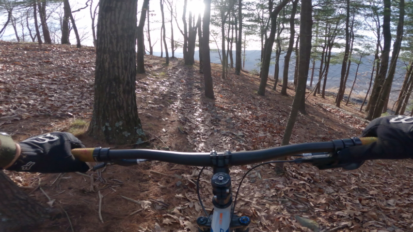 Fall Mountain Bike Ride Overlooking a Small Town