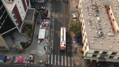 Aerial drone footage of skid row within different areas of downtown Los Angeles, CA.