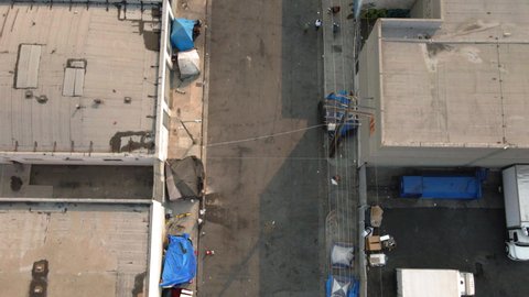 Aerial drone footage of skid row within different areas of downtown Los Angeles, CA.