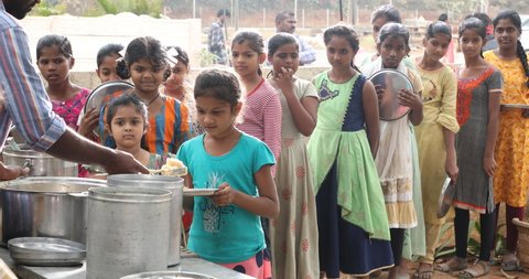 Serveing Food for Girls Village School Hyderabad India 1st Jan 2022