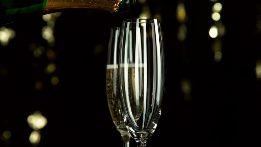 Super slow motion of pouring champagne wine with camera motion. Speed ramp effect. Filmed on high speed cinema camera, 1000fps. Royalty-Free Stock Footage #1086487871
