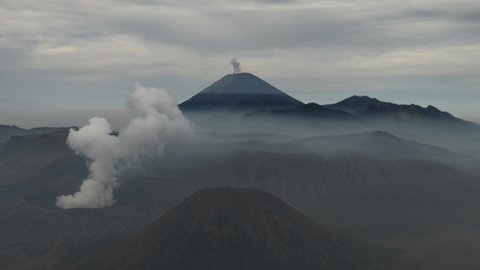 Mount Bromo, Mount Semeru, Batok active volcanoes in East Jawa, Indonesia. View of volcanoes Mount Gunung Bromo in Tengger Semeru National Park. 4K video. Wonderful Indonesia. King Kong viewpoint