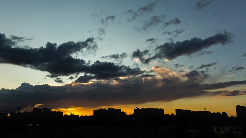 Landscape of sunset in the city. Timelapse of sunset. Time lapse, fast moving clouds in sunset sky | Shutterstock HD Video #1086498830