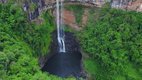 Chamarel Falls on the island of Mauritius, drone video of the waterfall surrounded by jungle