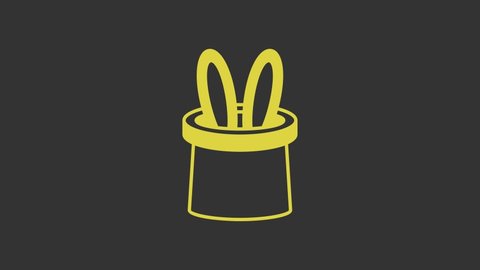 Yellow Magician hat and rabbit ears icon isolated on grey background. Magic trick. Mystery entertainment concept. 4K Video motion graphic animation.