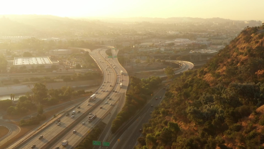 Aerial shot of the 5 freeway as it runs through the Elysian Valley in Los Angeles | Shutterstock HD Video #1086512786