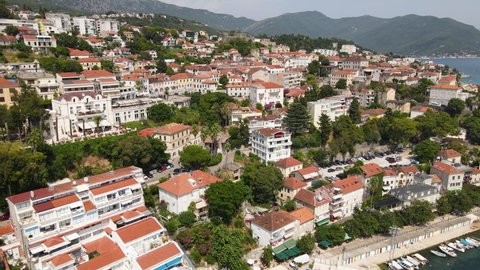 Aerial View of Herceg Novi, Montenegro. Cityscape Buildings on Hills Above Adriatic Sea, Drone Shot
