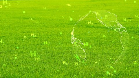 global digital with green H2 text particles flying on green grass background,concept green hydrogen clean energy all the world