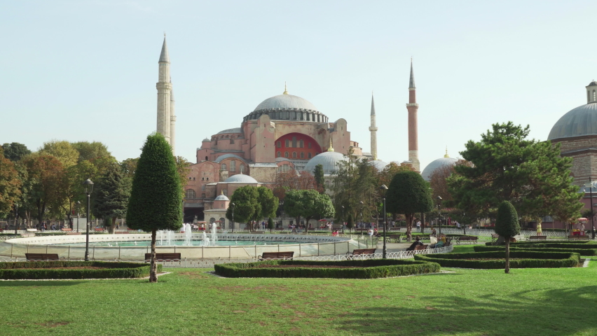 Awesome view of the Hagia Sophia among green gardens in Istanbul, Turkey. The Grand Mosque and formerly the Church is a popular destination among pilgrims and tourists of the world.