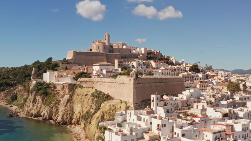 Aerial view of fortress in Ibiza city, the Old Town and the city walls of Eivissa, in the island of Ibiza, on a sunny and clear day.