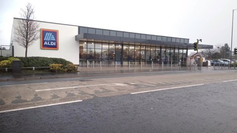 St Helens, Merseyside. UK. 02 06 2022 A busy Aldi supermarket in the pouring rain.