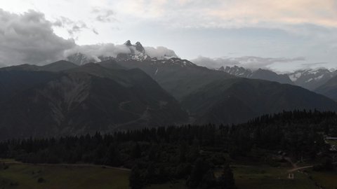 Aerial view of the mountains range with clouds and storm clouds. Caucasus Mountains, Svaneti region of Georgia.