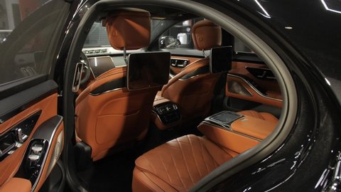 Lutsk, Volyn Oblast  Ukraine - February 23, 2021: Mercedes-Benz S-Class W223 brown leather interior of a prestigious car, seats, steering wheel, airbag, doors.