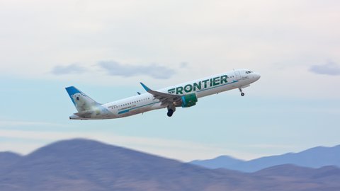 LAS VEGAS, NV - 2022: Frontier Airlines Airbus A321 Jet Airliner with Powder The Polar Bear Livery Taking off from Las Vegas LAS Harry Reid International Airport Runway in Nevada