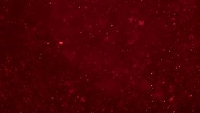 Bokeh of sparkling glittering lights in the shape of hearts flowing and falling across the screen, glowing in red and pink. Magical romantic abstract background. Loop. - Powered by Shutterstock - Get 15% off with code: PIKWIZARD15
