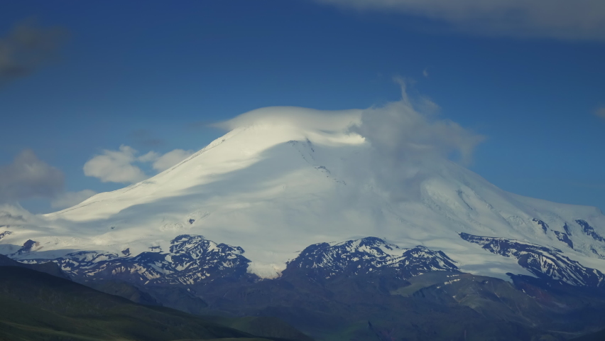 Beautiful view of Mount Elbrus and clouds, North Caucasus mountains, Russia, timelapse 4k