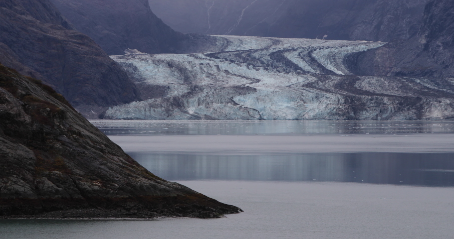 Glacier Bay Alaska cruise vacation travel.. Nature landscape of Lamplugh Glacier and Mount Fairweather Range mountains