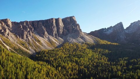 High mountains and cliffs. Aerial view from a drone. The Dolomite Alps, Italy. Summer landscape in a mountainous region. 
