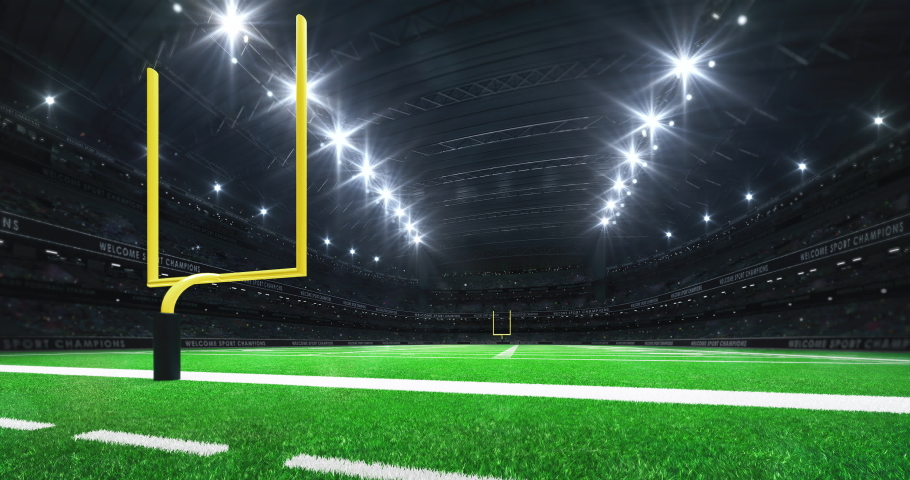 American football stadium and view behind the yellow goal post on grass field with glowing spotlights on the top. Sport advertisement 4K video loop. Royalty-Free Stock Footage #1086588938