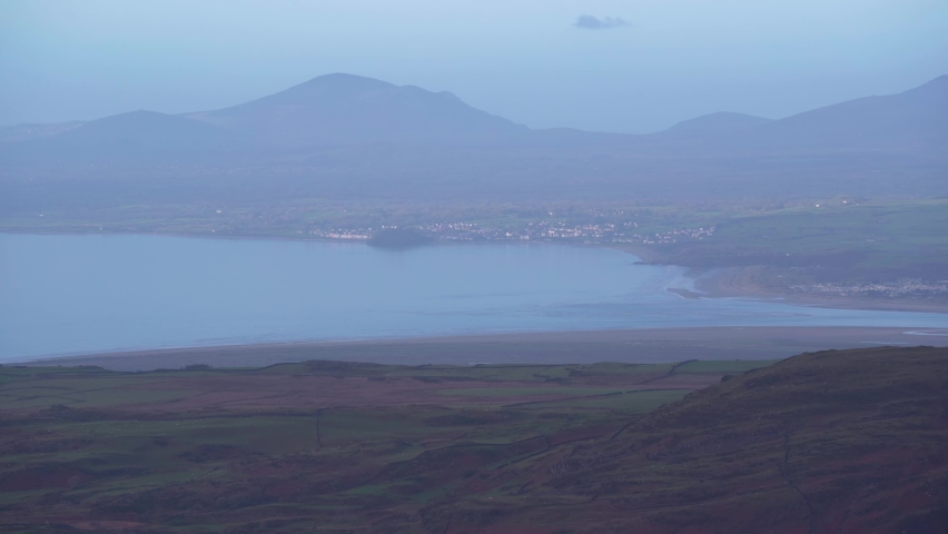 Long range aerial view of the Welsh coast and Porthmadog