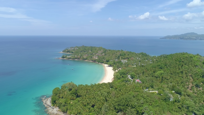 Amazing beautiful beach Aerial view of Tropical beach sea in the beautiful Phuket island Located at Surin beach Phuket Thailand on February 7-2022 | Shutterstock HD Video #1086599357