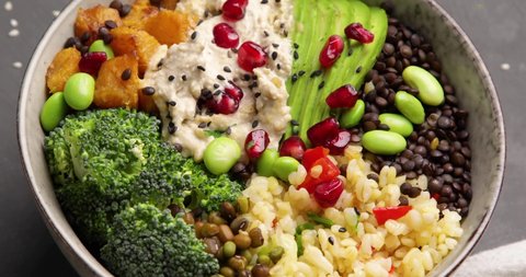 Buddha bowl, healthy and balanced food, vegan diet. Top view, closeup