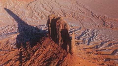 Drone shot of epic sunrise over Mitten Butte mesa in Monument Valley in Arizona USA. Cowboy culture, wild west landscape, Western movie location, Navajo culture native land at cinematic sunrise 4K 
