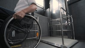 Special elevator for the person with a physical disabilities. A man in a wheelchair uses a special elevator - Powered by Shutterstock - Get 15% off with code: PIKWIZARD15