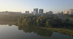 4K high quality summer morning aerial drone video of Moscow River channel and auto dual highway bridge in Moscow, Russia