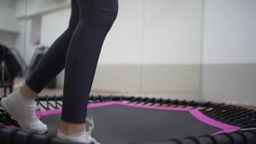 Video footage of Fitness sport woman in fashion sportswear doing sport exercise in livingroom at her home HD Slow motion