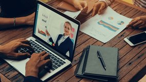 Creative visual of business people in a corporate staff meeting on video call . Concept of digital technology for marketing data analysis and investment decision making . - Powered by Shutterstock - Get 15% off with code: PIKWIZARD15