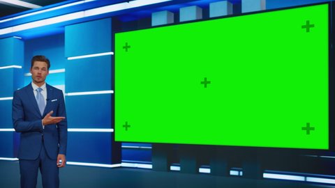 Talk Show TV Program: Handsome White Male Presenter Standing in Studio, Uses Big Green Chroma Key Screen. News Achor, Presenter Talks About News, Weather. Playback Mockup Cable Channel. Medium