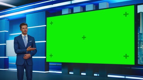 Talk Show TV Program: Handsome White Male Presenter Standing in Newsroom Studio, Uses Big Green Chroma Key Screen. News Achor, Presenter Talks About News, Weather. Playback Mock-up Cable Channel