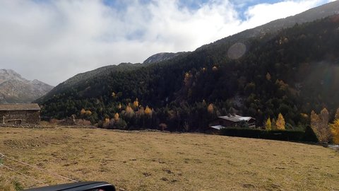 Autumn trees in the Pyrenees mountains Andorra Incles valley