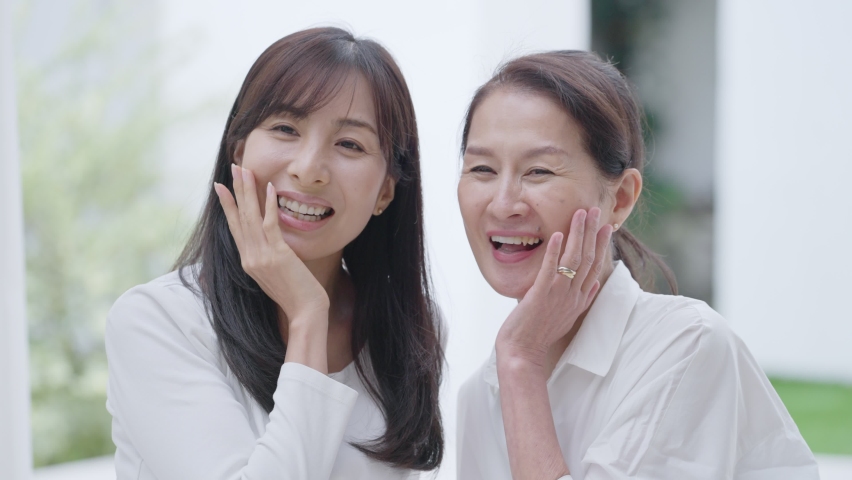 Smiling middle-aged Asian women in the room. Royalty-Free Stock Footage #1086650951