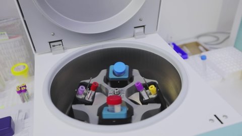 Rotation of medical samples in a laboratory centrifuge. Laboratory centrifuge. Medical centrifuge operation