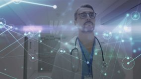 Animation of networks of connections over caucasian doctor in hospital. global medicine, healthcare and technology concept digitally generated video.