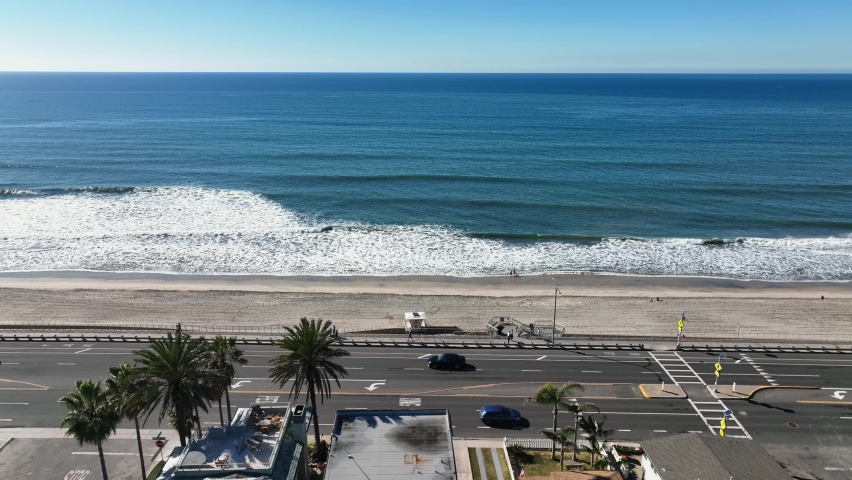 Aerial view of a Coast Highway near the beach in Carlsbad, California. Low traffic on the road.