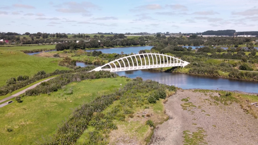 Te Rewa Rewa Bridge, New Plymouth, New Zealand. Spectacular shaped bridge in recreation area - aerial birds eye