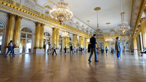 Saint Petersburg, Russia, May 11, 2021. Winter Palace in St. Petersburg, interior of the Hermitage Museum. People visiting the halls and rooms of the tsarist times of the Russian Empire.