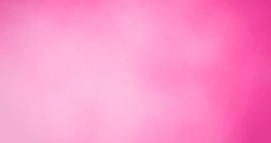 Animation of hearts falling on pink background. heart month and celebration concept digitally generated video.